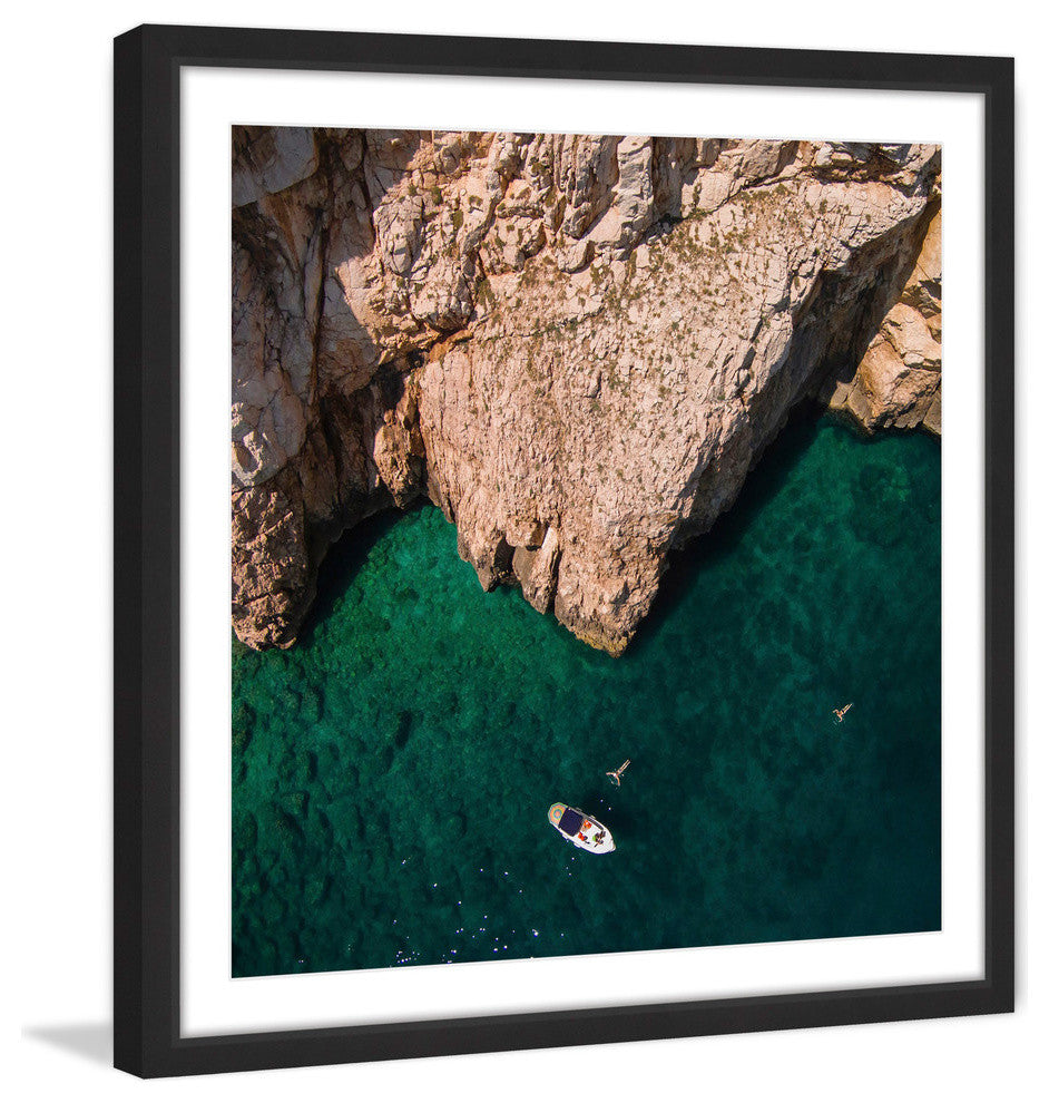 "Jagged Cliffs" Framed Print by Karolis Janulis