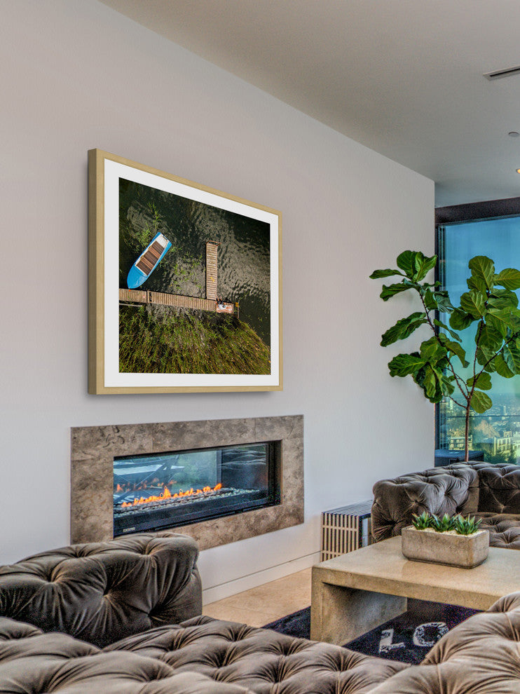 "Blue Boat" Framed Print by Karolis Janulis