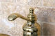 Kingston Brass Single-Handle Bathroom Faucet With Push Pop-Up, Polished Brass