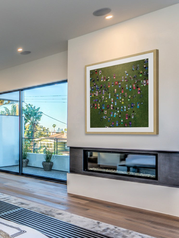 "People On Towels" Framed Print by Karolis Janulis