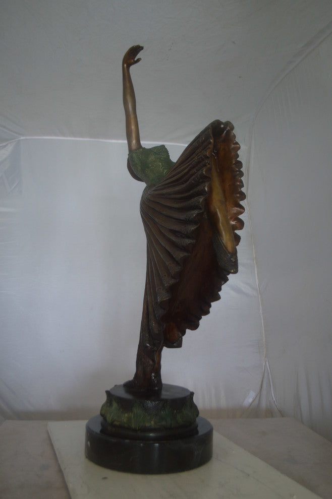 Beautiful Dancer Performing Bronze Statue -  Size: 27"L x 12"W x 48"H.