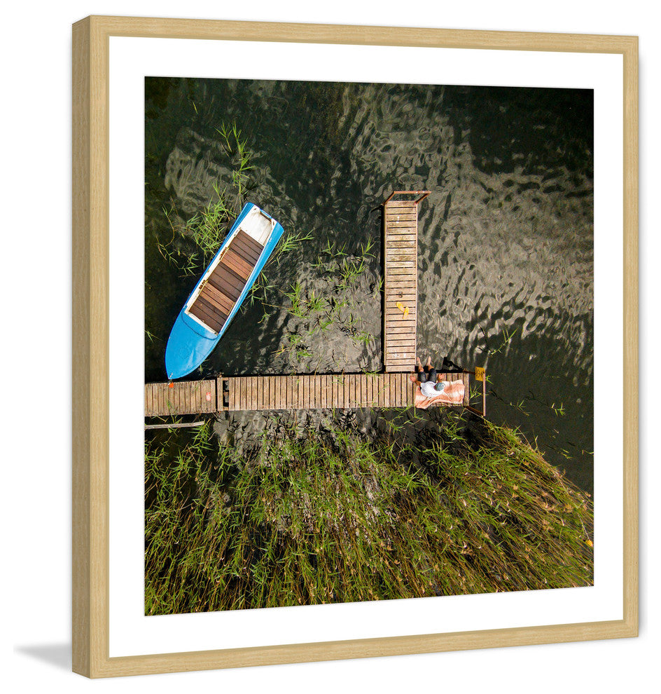 "Blue Boat" Framed Print by Karolis Janulis