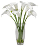 White calla lilies in glass vase