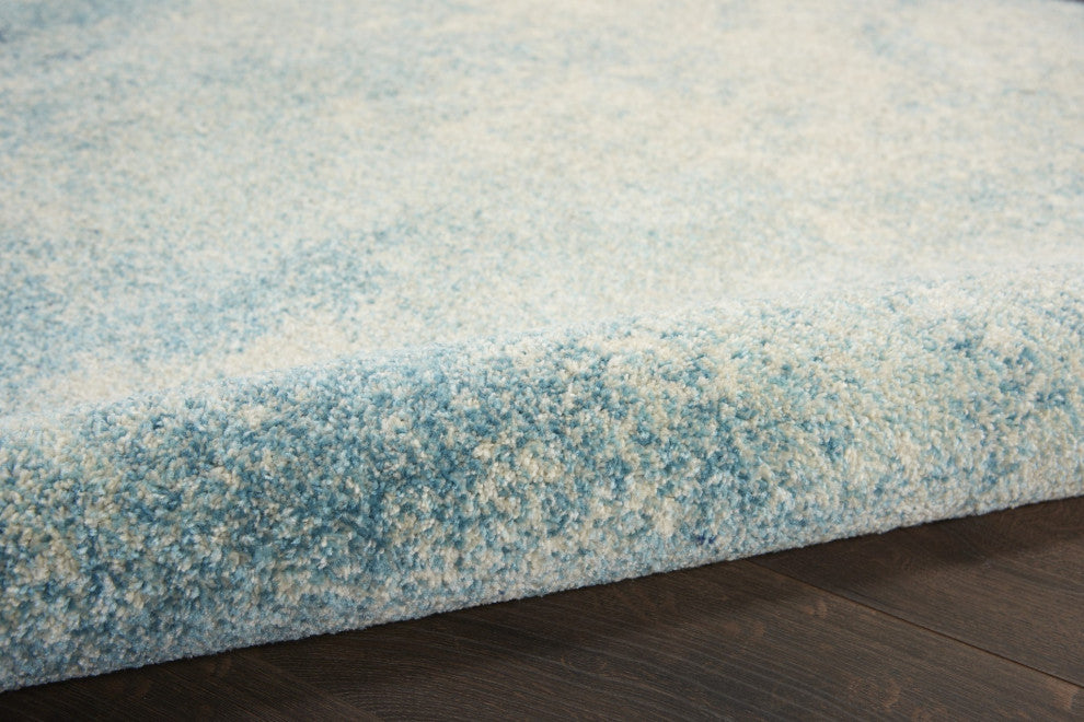 8' Ivory And Blue Round Abstract Power Loom Area Rug