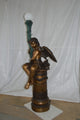 Pair of Cupid on stand lamp -  Size: 28"L x 24"W x 90"H.