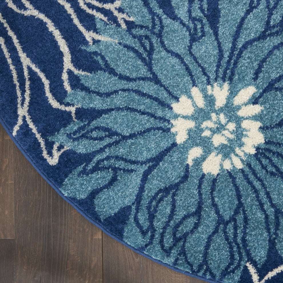 8' Blue And Ivory Round Floral Dhurrie Area Rug
