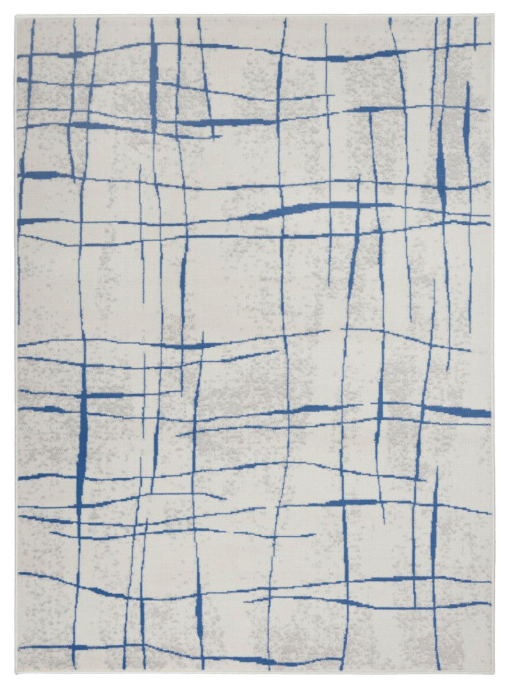 6' X 9' Blue And Ivory Abstract Dhurrie Area Rug