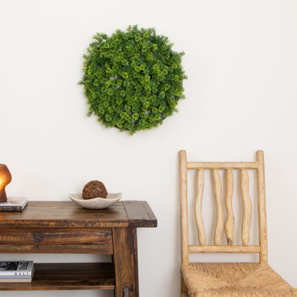 Lifestyle: single moss panel mounted above bed in bedroom.