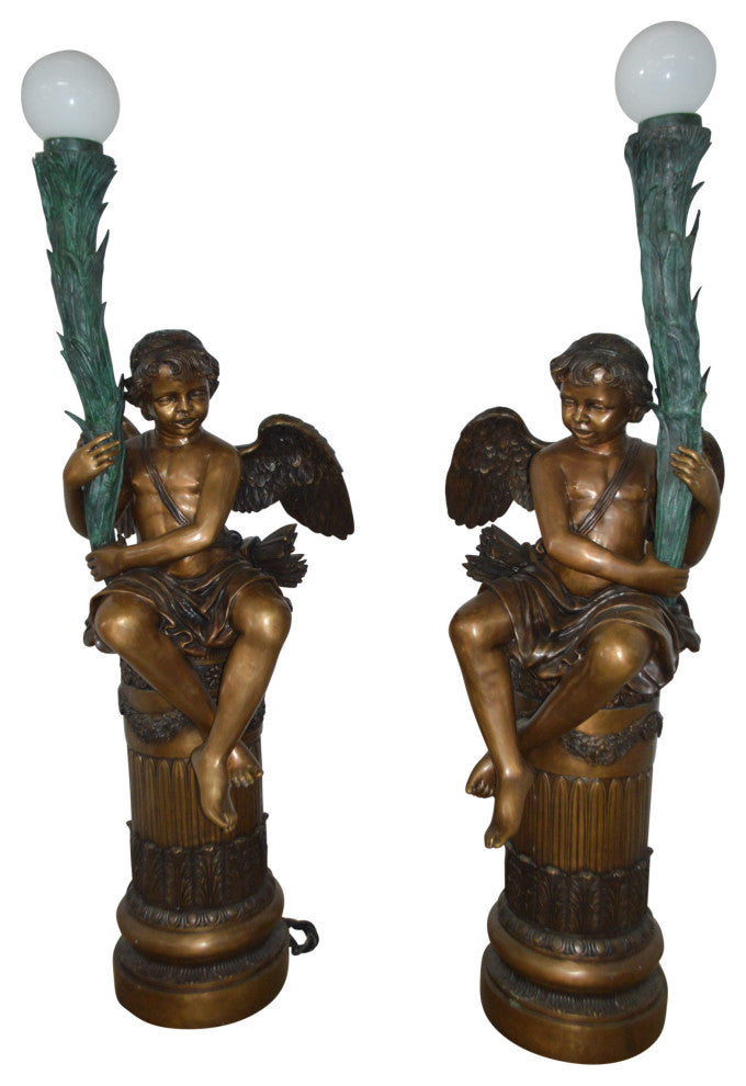 Pair of Cupid on stand lamp -  Size: 28"L x 24"W x 90"H.