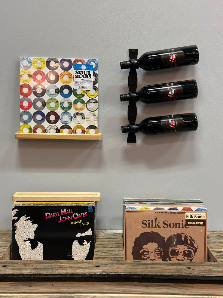 Helix Single 15 (minimalist wall mounted metal wine rack), Matte Black, Right Facing Bottle