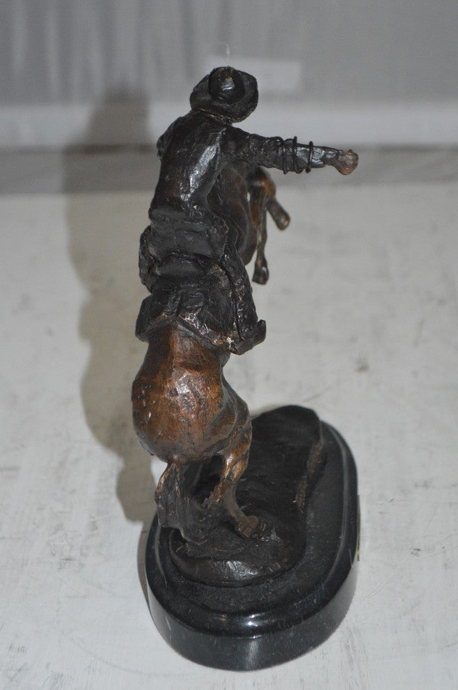 Bronco Buster by Remington Bronze Statue -  3" x 7" x 10"H.