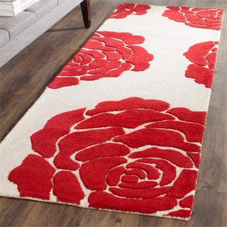 Safavieh Cambridge 6' Round Hand Tufted Wool Rug in Ivory and Red