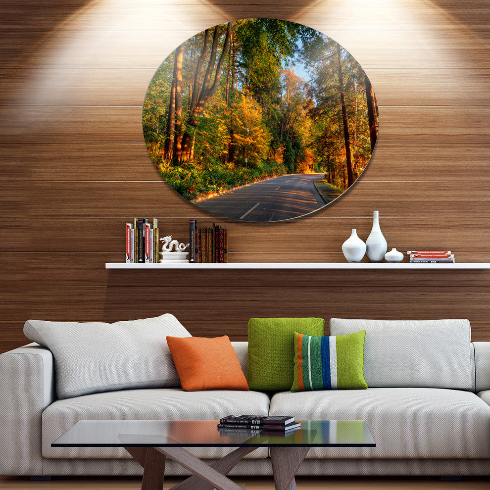 Road Through Lit-Up Fall Forest, Landscape Round Metal Wall Art, 36"