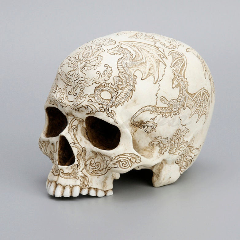Skull Statue - Thistle Flying Dragon Coat Of Arms