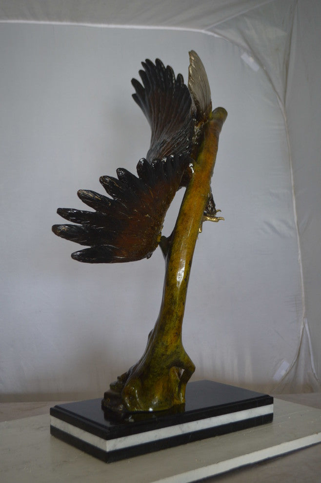 Eagle Soaring Bronze Statue by W Aribu -  Size: 35"L x 27"W x 38"H.