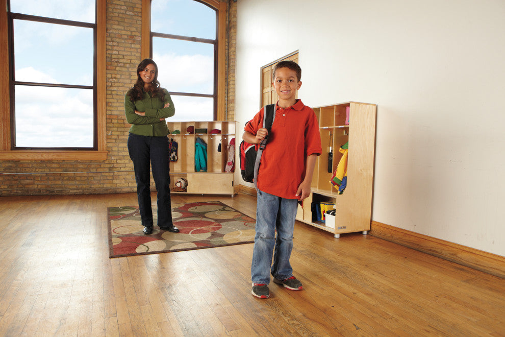 Lifestyle shot with a child near the unit in a room; product visible.