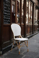 Isabell Rattan Bistro Side Chair, White With Cappuccino Dots