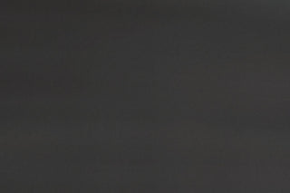 Plain dark surface/texture with no visible product; does not meet any primary image criteria.