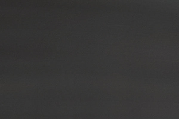 Plain dark surface/texture with no visible product; does not meet any primary image criteria.