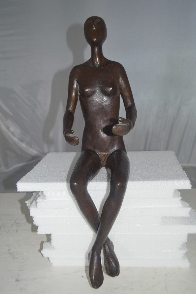 Abstract of Nude Girl sitting Bronze Statue -  Size: 9"L x 6"W x 21"H.