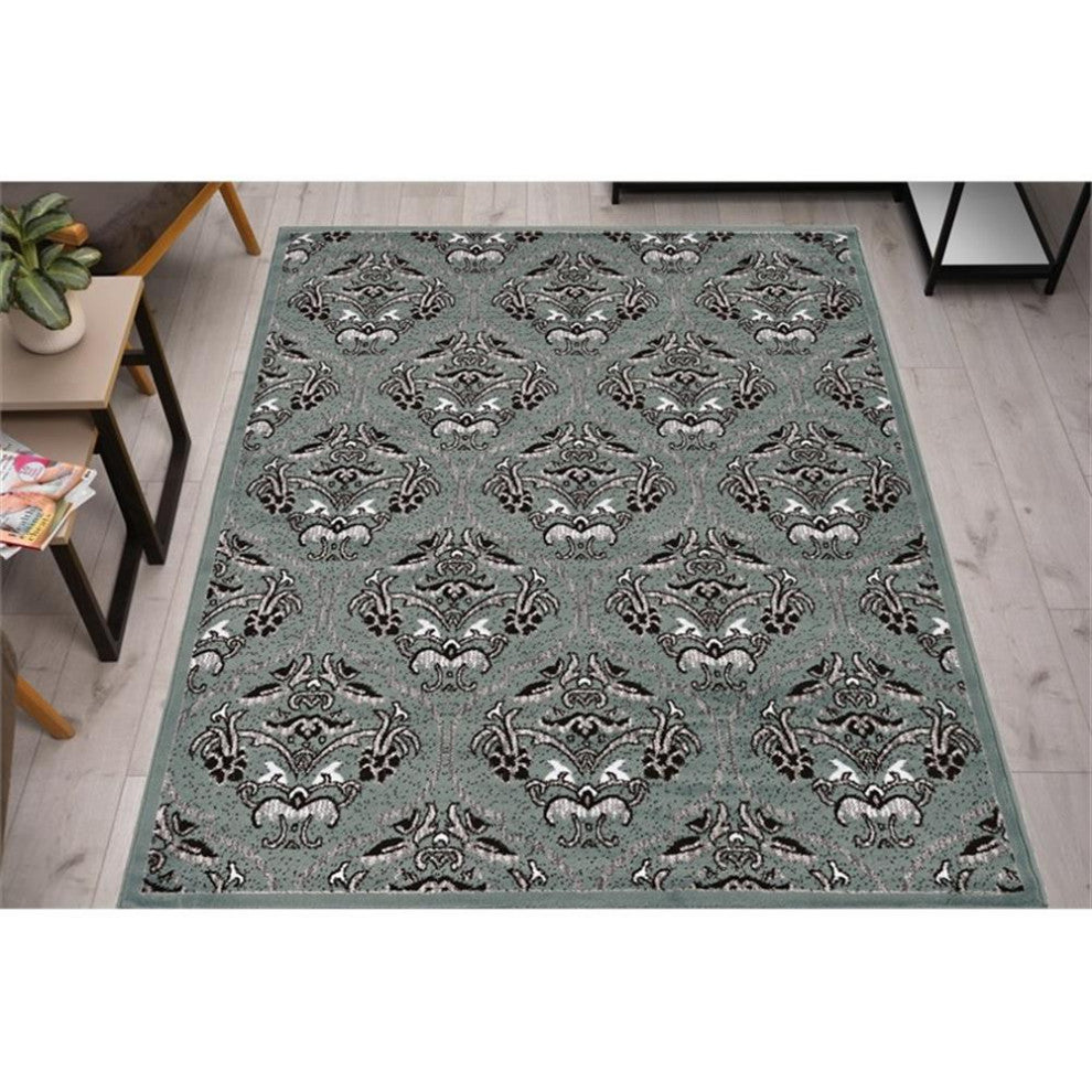 Linon Elegance England Power Loomed Polypropylene 5'x7'3" Rug in Turquoise Blue