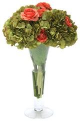 Green Hydrangeas and Coral Ranunculus in Trumpet Vase