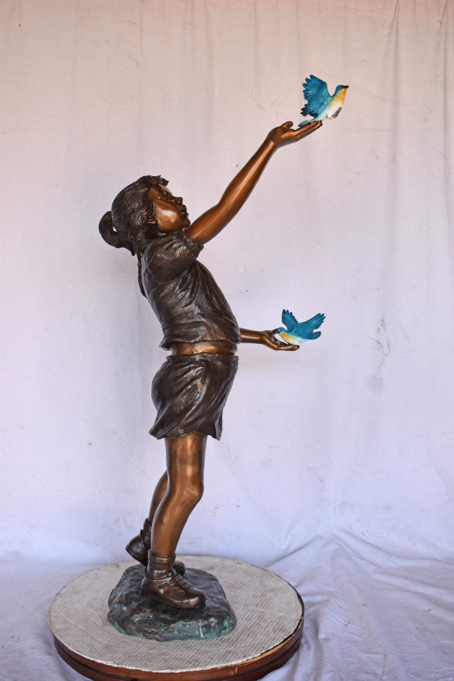 Girl, sandy, with two Blue birds Bronze Statue - Size: 25"L x 23"W x 41"H.