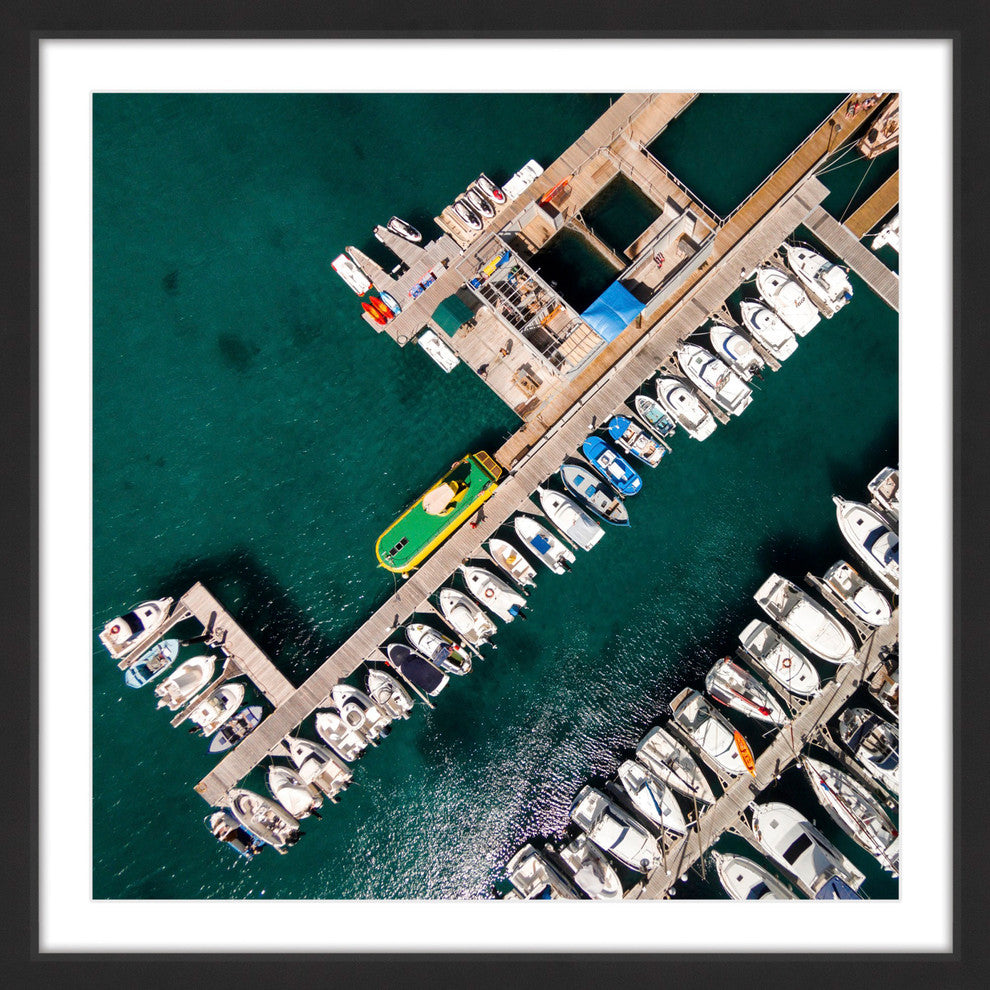 "Neatly Docked Boats" Framed Print by Karolis Janulis