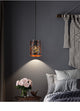 Mini Pierced hanging light black cage hollow-carved pendant light