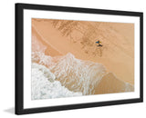 "Lapping The Sand" Framed Print by Karolis Janulis
