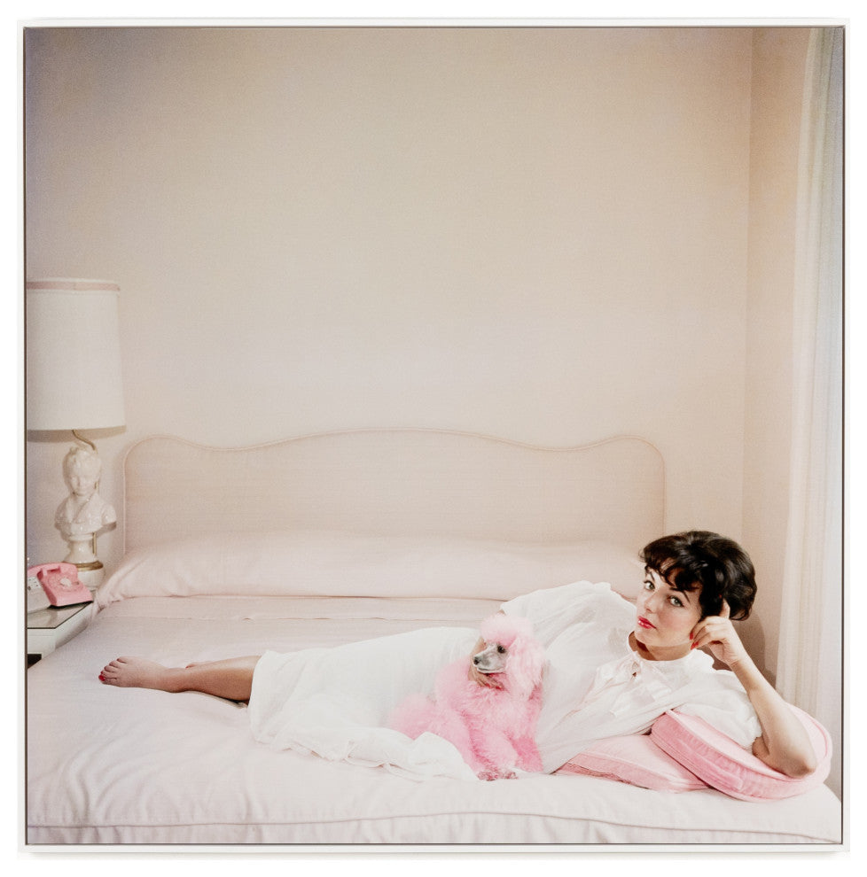 Joan Collins Relaxes By Slim Aarons