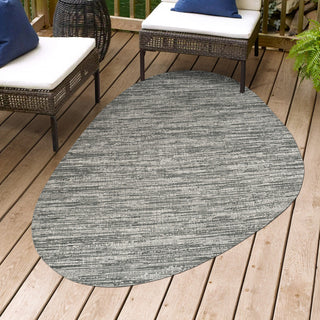 Callan Modern Rustic Abstract Indoor/Outdoor Shaped Area Rug