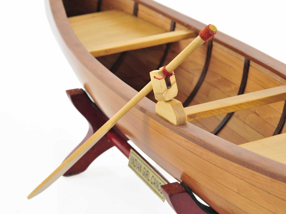 HomeRoots Indian Girl Canoe Boat Model Sculpture