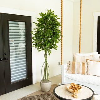 Lifestyle shot showing the tree in a living room setting.