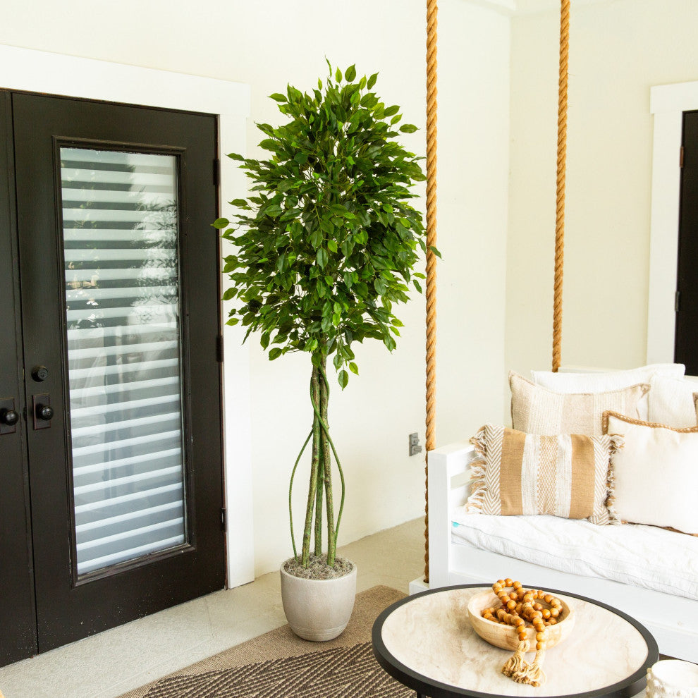 Lifestyle shot showing the tree in a living room setting.