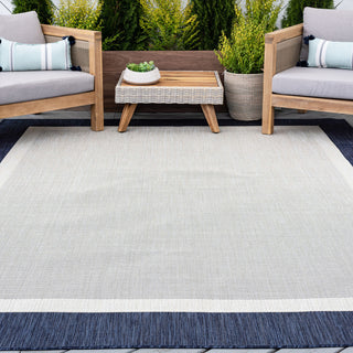 Dania Transitional Solid Border Navy Rectangle Indoor/Outdoor Area Rug, 8'x10'