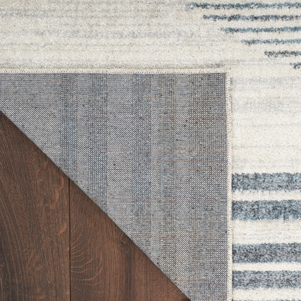 Nourison Astra Machine Washable 7' x 9' Ivory Blue   Area Rug