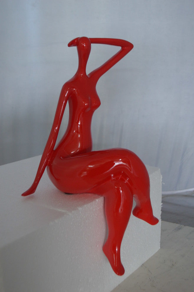 Modern Art Sitting on Edge Girl Made of Resin -  Size: 9"L x 7"W x 16"H.