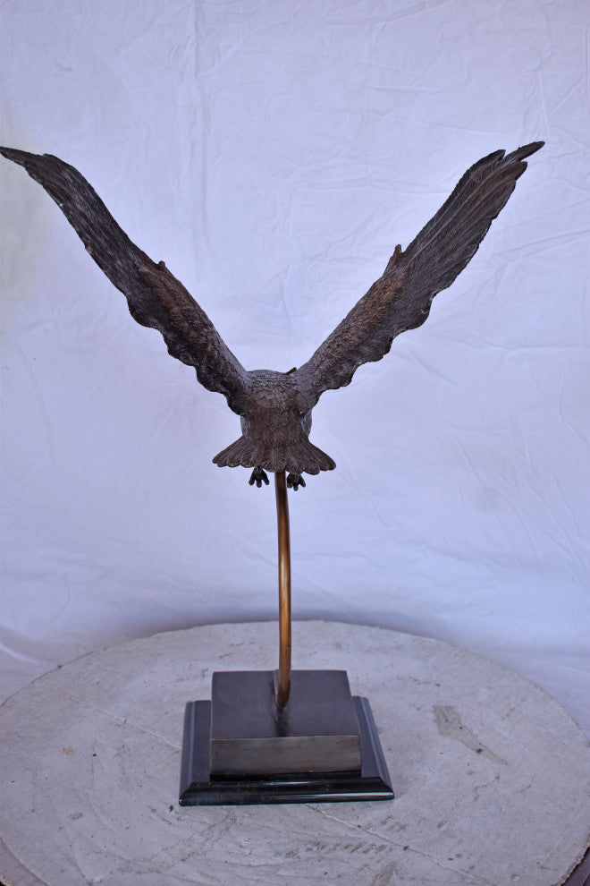 Owl Searching for Prey Bronze Statue Size: 18"L x 11"W x 22"H.