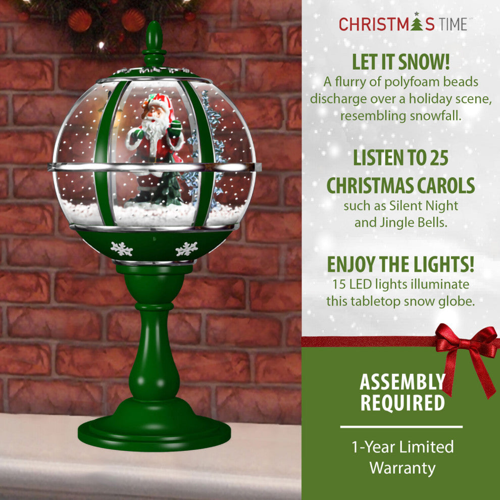 23" Tabletop Musical Snow Globe With Santa Scene, Snow, and Carols, Green