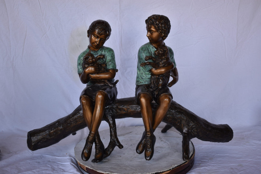 Boy and Girl With Pets Sitting on Log Bronze Statue Size: 44"L x 22"W x 26"H