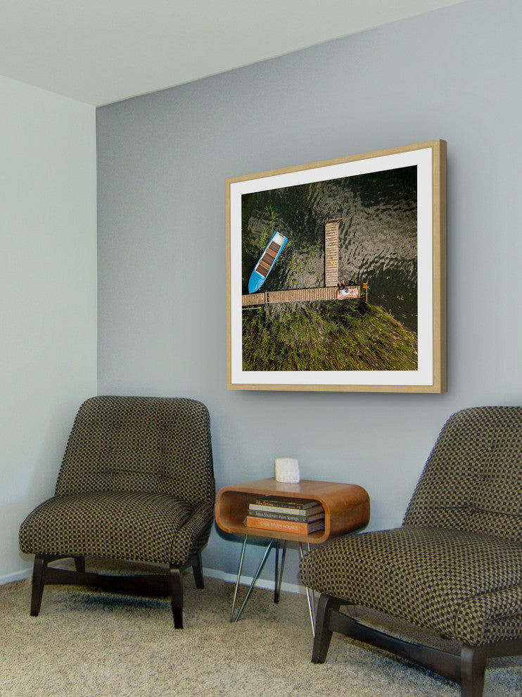 "Blue Boat" Framed Print by Karolis Janulis