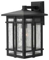 Tucker Medium Outdoor Wall Sconce, Museum Black With Clear Seedy Glass