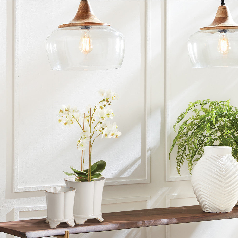 Lifestyle environment: real interior context with the orchid product; not on a plain white background.