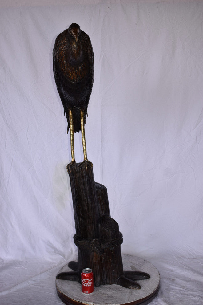 Crane Head Down Standing on A Tree Stump Bronze Statue Size: 23" x 16" x 55"H