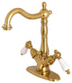Kingston Brass Two-Handle Bathroom Faucet With Brass Pop-Up, Brushed Brass