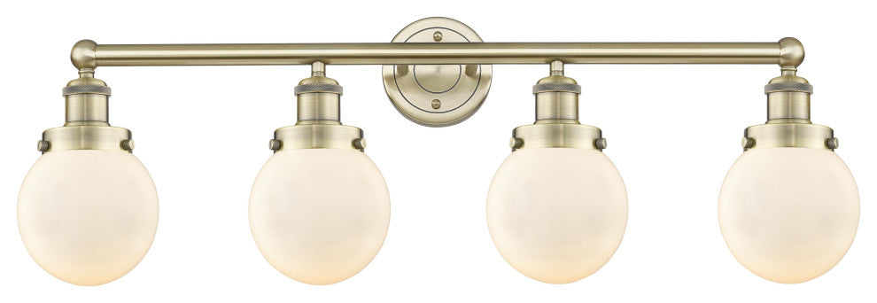 Small Beacon 4-Light 34" Vanity Light, Antique Brass Finish, Matte White Shade