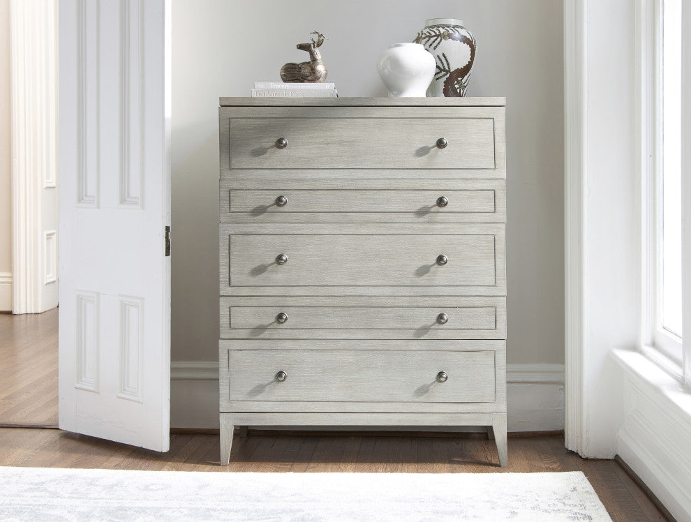 Lifestyle image: dresser shown in a real room setting with doorway and decor; not on white background.