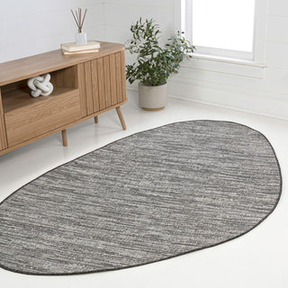 Callan Modern Rustic Abstract Indoor/Outdoor Shaped Area Rug