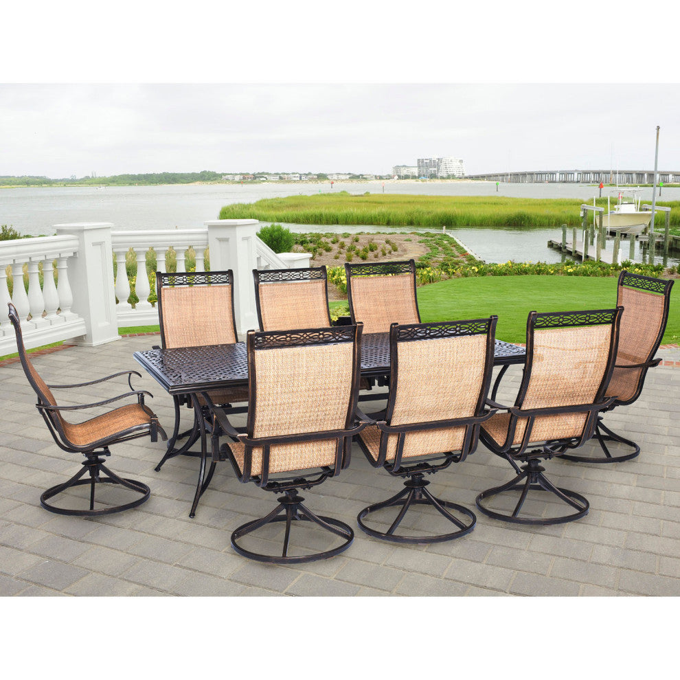 Manor 9-Piece Outdoor Dining Set With Eight Swivel Rockers